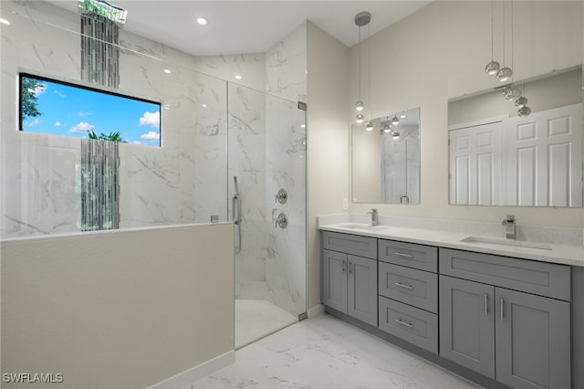 full bath with double vanity, a sink, marble finish floor, and a marble finish shower