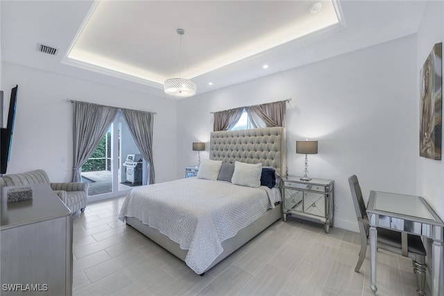 bedroom with baseboards, visible vents, a raised ceiling, access to exterior, and recessed lighting