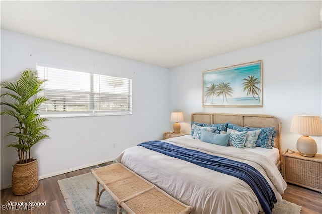 bedroom featuring wood-type flooring