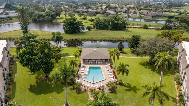 birds eye view of property featuring a water view