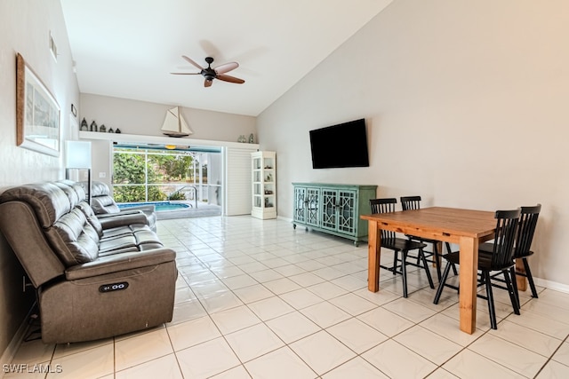 tiled living room featuring high vaulted ceiling and ceiling fan