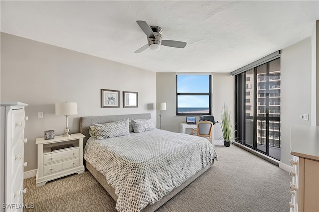 bedroom with access to outside, ceiling fan, and light colored carpet