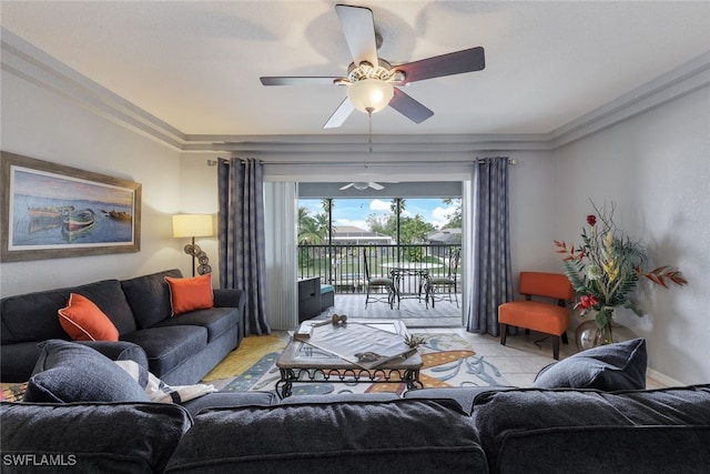 living room featuring ceiling fan and ornamental molding