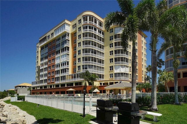 view of property featuring a community pool