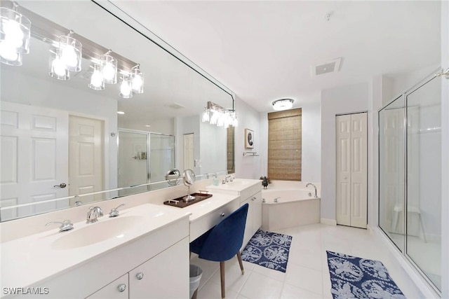 bathroom featuring plus walk in shower, tile patterned flooring, and vanity