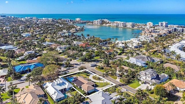 bird's eye view with a water view