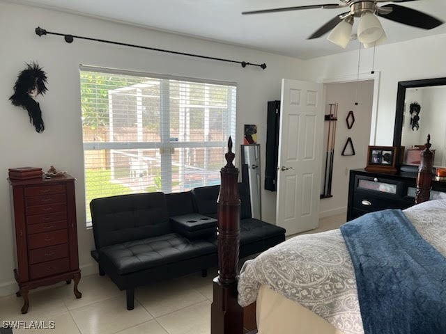 bedroom with light tile patterned floors and a ceiling fan