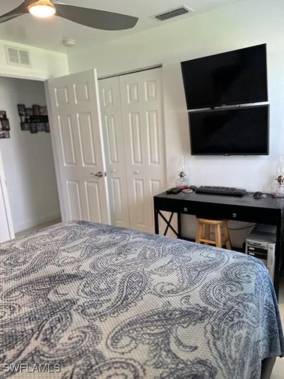 bedroom featuring ceiling fan, a closet, and visible vents