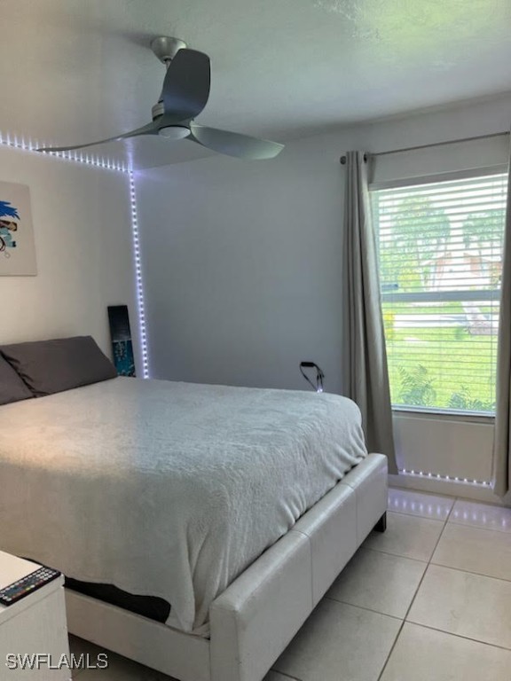 bedroom featuring light tile patterned floors