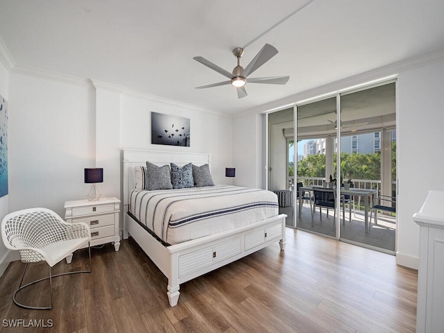 bedroom with ornamental molding, access to outside, and dark hardwood / wood-style flooring