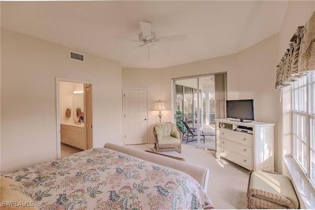 bedroom with carpet floors, multiple windows, visible vents, and access to exterior