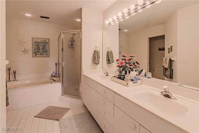 full bath with a garden tub, visible vents, a sink, and a stall shower