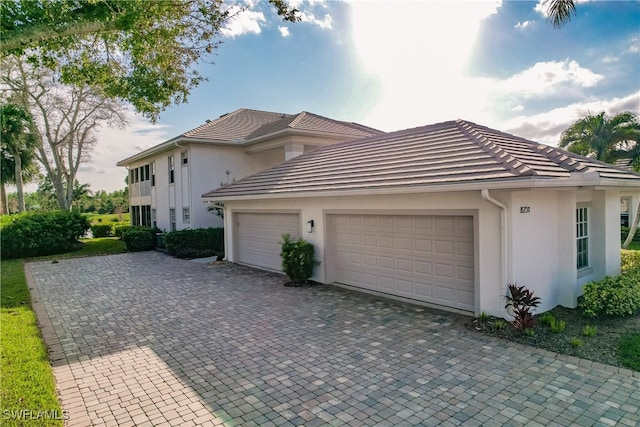 exterior space with a garage