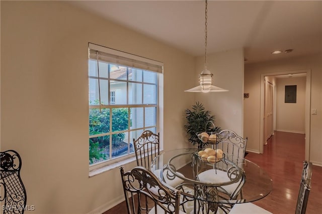 dining space featuring recessed lighting, dark wood finished floors, electric panel, and baseboards