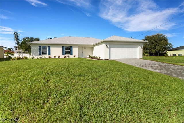 ranch-style home with a garage and a front lawn