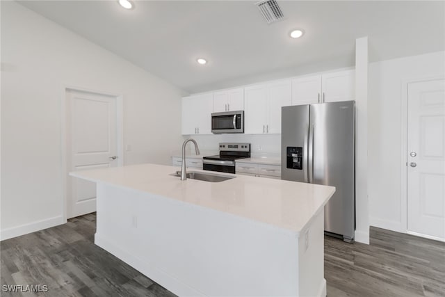 kitchen featuring appliances with stainless steel finishes, a kitchen island with sink, sink, and white cabinets