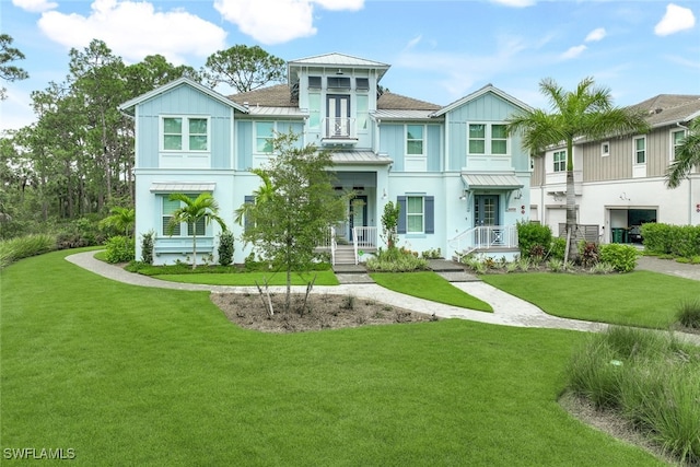 view of front of home featuring a front yard