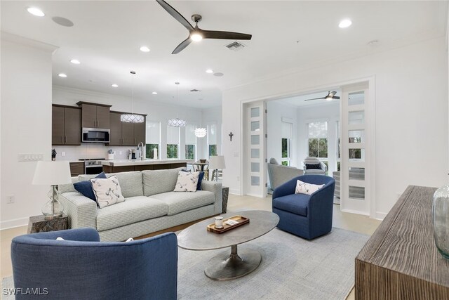 living room with crown molding