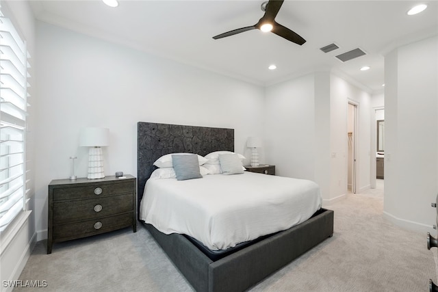 carpeted bedroom with ornamental molding, multiple windows, and ceiling fan