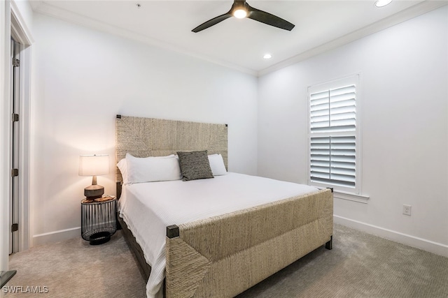 bedroom with crown molding, carpet, and ceiling fan