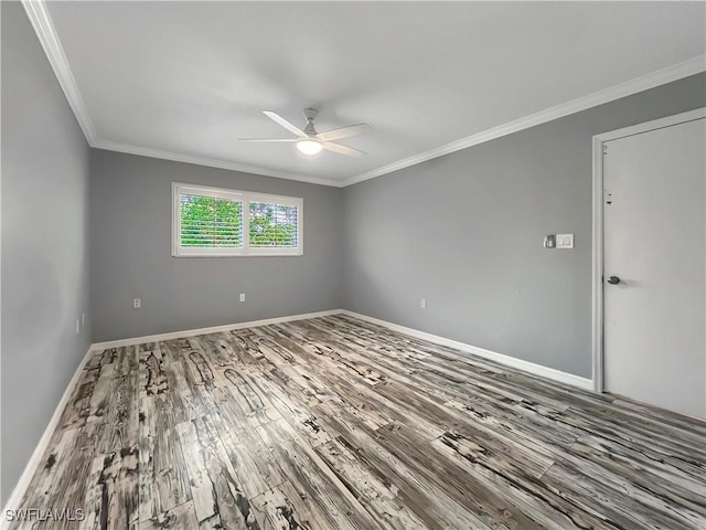 unfurnished room featuring ceiling fan, wood-type flooring, and crown molding