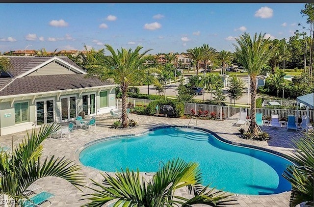 view of swimming pool featuring a patio