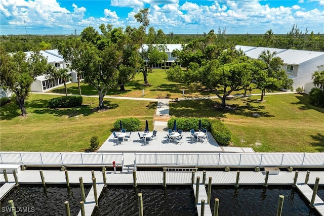 dock area with a lawn and a patio area