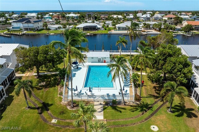 bird's eye view with a water view