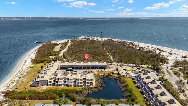 aerial view with a view of the beach and a water view