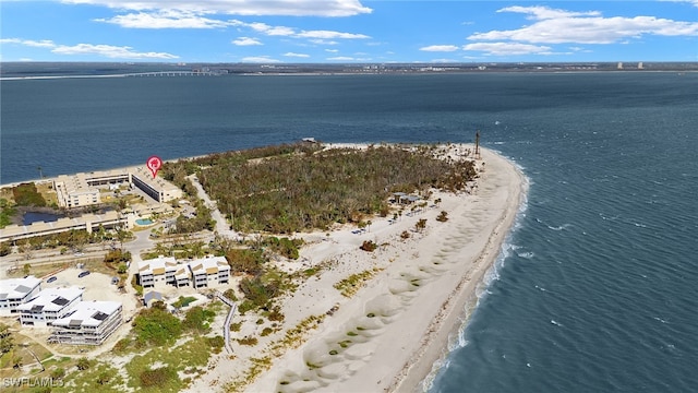 bird's eye view with a view of the beach and a water view