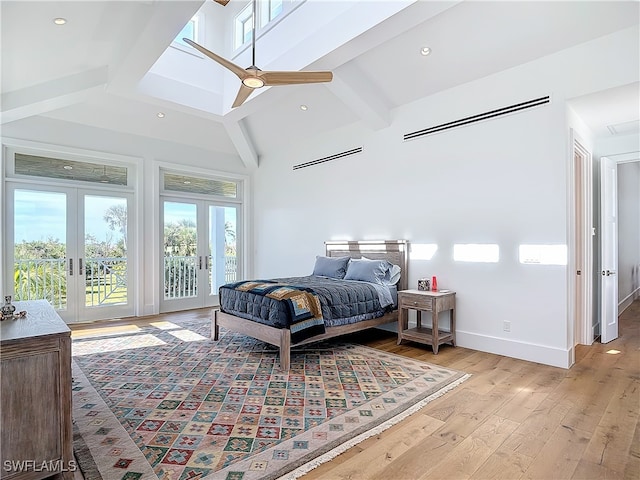 bedroom featuring light wood-type flooring, access to outside, high vaulted ceiling, ceiling fan, and french doors