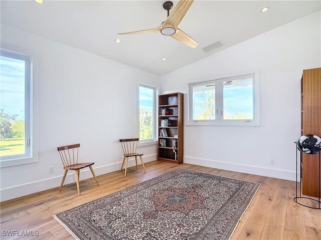 9345 Dimmick Dr, Sanibel, FL 33957 - living area with ceiling fan, lofted ceiling, wood finished floors, and visible vents