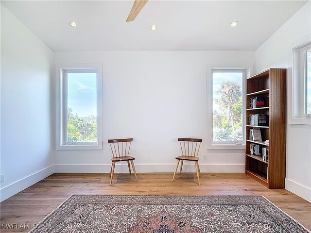 9345 Dimmick Dr, Sanibel, FL 33957 - sitting room with recessed lighting, baseboards, and wood finished floors