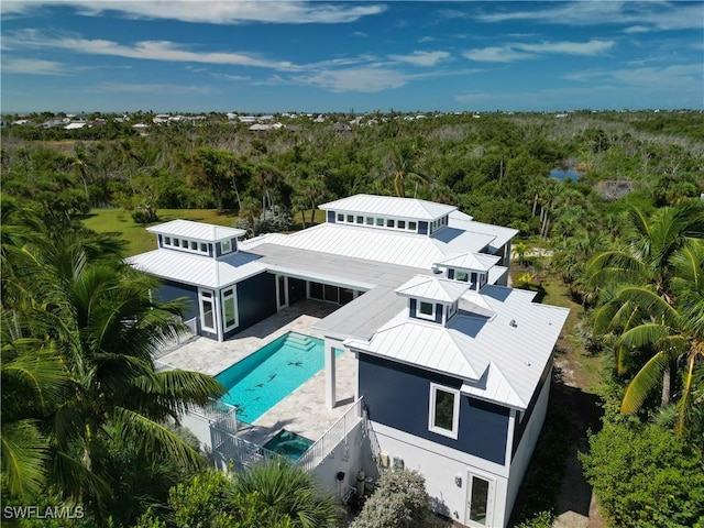 9345 Dimmick Dr, Sanibel, FL 33957 - bird's eye view featuring a wooded view
