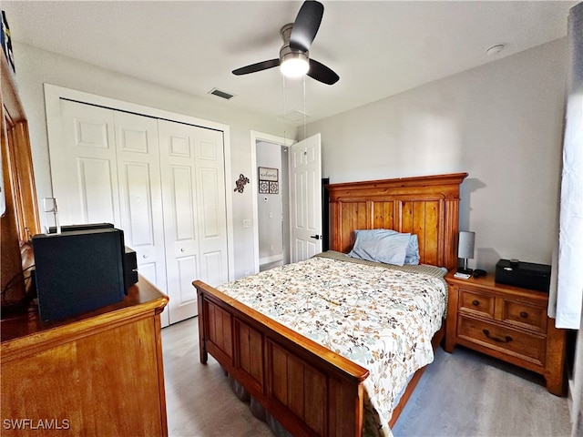 bedroom with a closet and ceiling fan