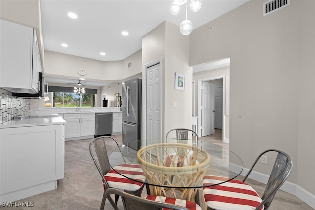 dining space with sink