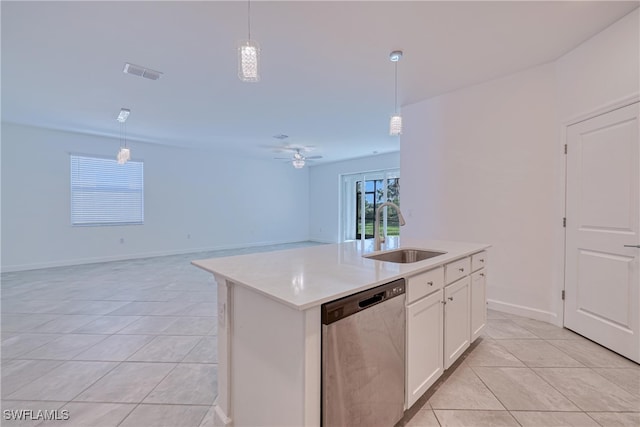 kitchen with sink, stainless steel dishwasher, a kitchen island with sink, decorative light fixtures, and white cabinetry