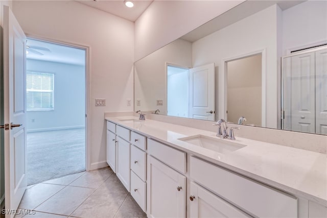 bathroom featuring tile patterned floors and vanity