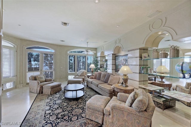 living room with ceiling fan, visible vents, and recessed lighting