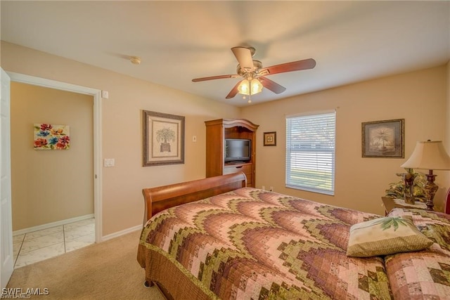 bedroom featuring ceiling fan and light colored carpet