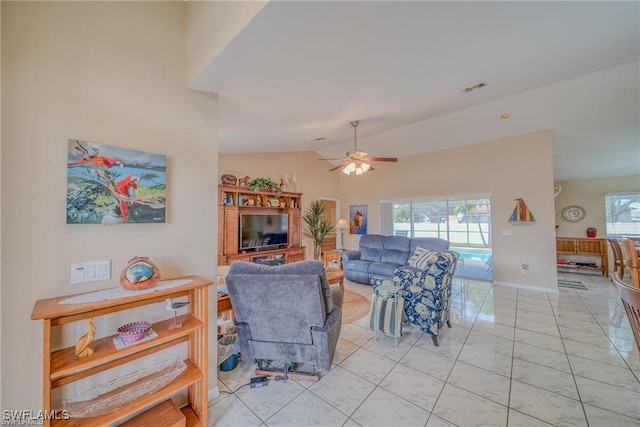 living room with vaulted ceiling and ceiling fan