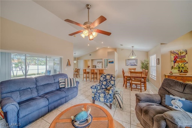 living room with light tile patterned floors, vaulted ceiling, and ceiling fan