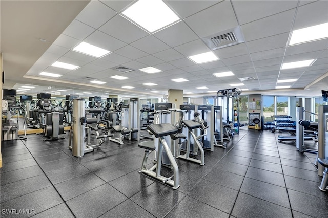 workout area with a drop ceiling