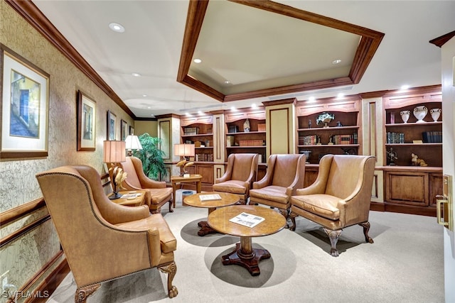 interior space with light carpet, a tray ceiling, and crown molding