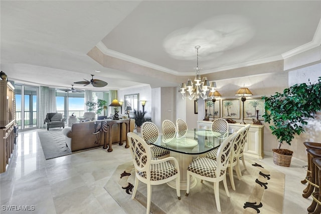 dining room featuring ceiling fan with notable chandelier and crown molding