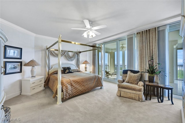 carpeted bedroom with ceiling fan, crown molding, and access to outside