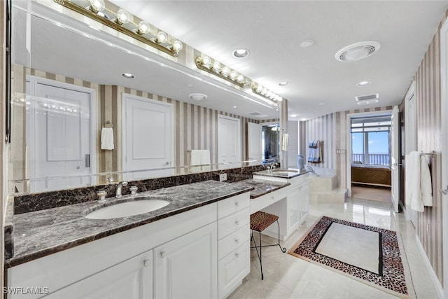 bathroom with vanity and tile patterned floors