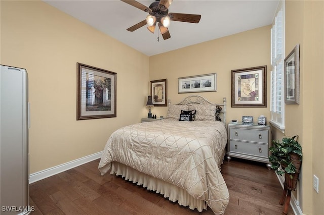 14250 Royal Harbour Ct Unit 817, Fort Myers, FL 33908 - bedroom featuring dark wood-style floors, baseboards, and a ceiling fan
