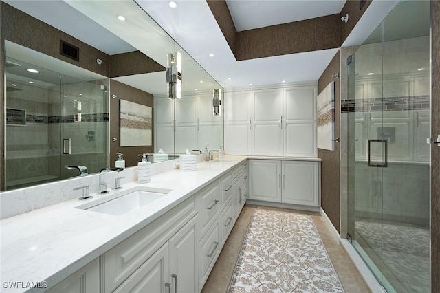 14250 Royal Harbour Ct Unit 817, Fort Myers, FL 33908 - bathroom featuring a stall shower, double vanity, tile patterned flooring, and recessed lighting