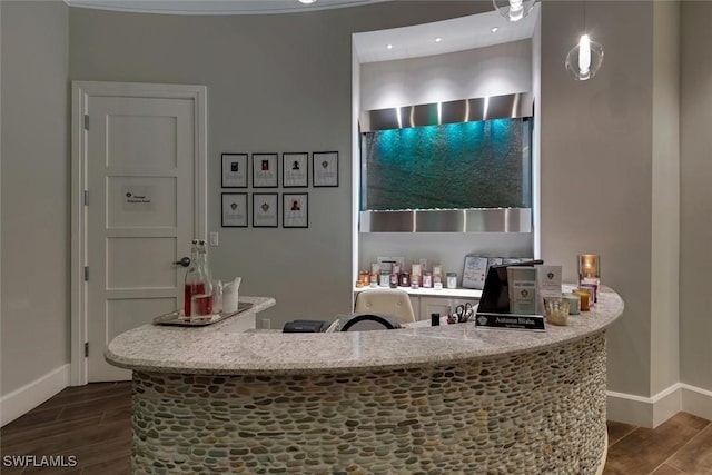 14250 Royal Harbour Ct Unit 817, Fort Myers, FL 33908 - bar featuring baseboards and dark wood finished floors